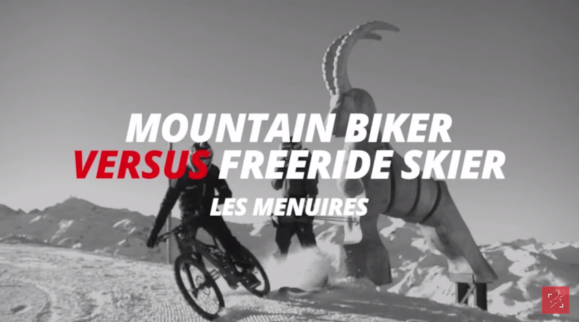 skier v mountain biker race